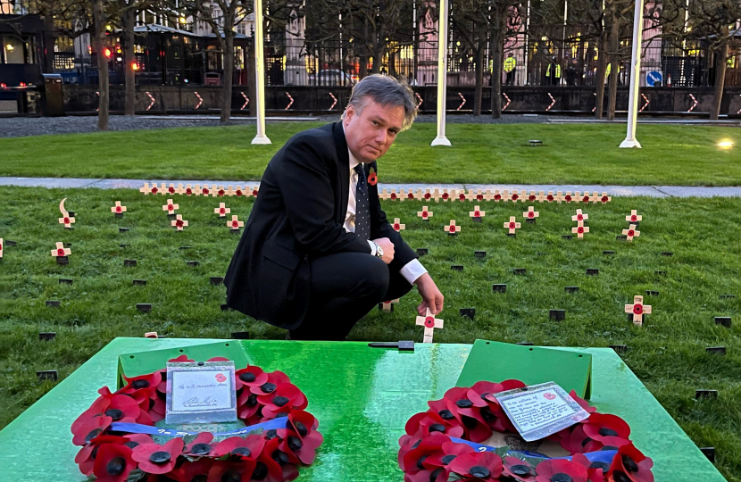 Henry Smith MP plants wooden cross in Parliamentary Garden of Remembrance in honour of Crawley's fallen