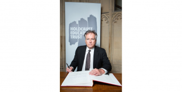 Henry Smith MP signs Holocaust Educational Trust Book of Commitment marking 79 years since the liberation of the concentration camps